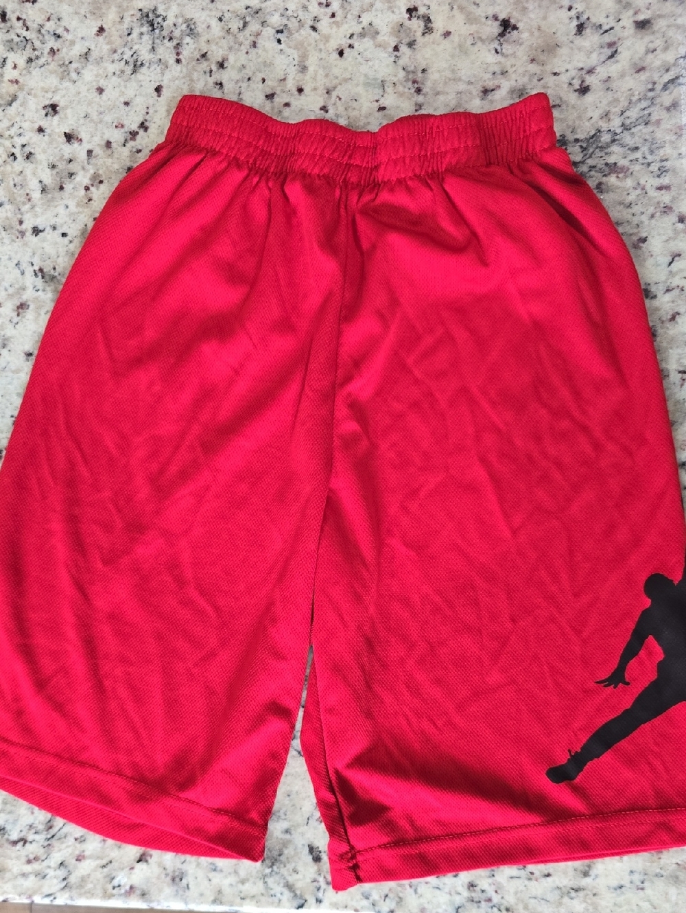 Jordan Red Athletic Shorts with Black Jumpman Tag